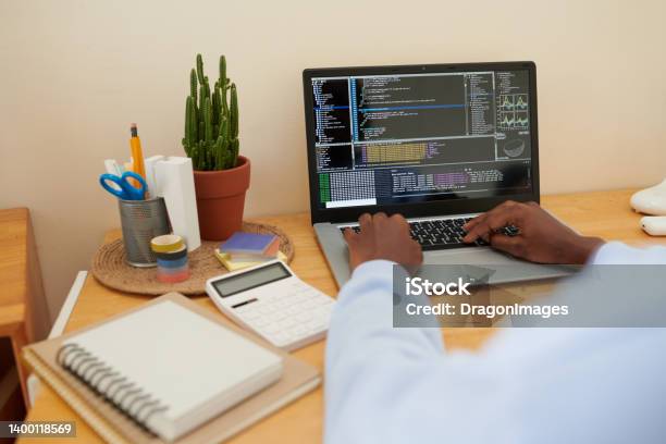 College Student Coding On Laptop Stock Photo - Download Image Now - 20-24 Years, Adult, Apartment