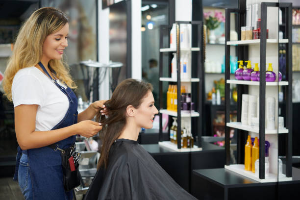 Hairstylist Asking Customer about Preferences stock photo