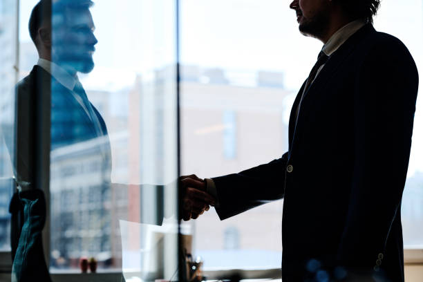 istock Business partners concluding a deal 1400121115
