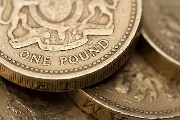 istock British One Pound Coin On A Pile 140012556
