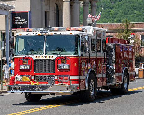Suffern, NY - USA - May 30, 2022 Fire trucks of the Suffern Fire Department participate in the Annual Memorial Day Parade and Ceremony.
