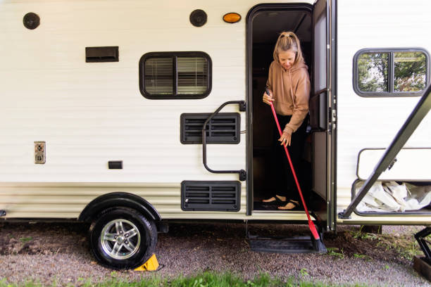 istock Mature woman getting RV ready for summer vacations. 1400129333