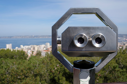 Viewpoint on a hill in Marseille, France, with mounted binoculars