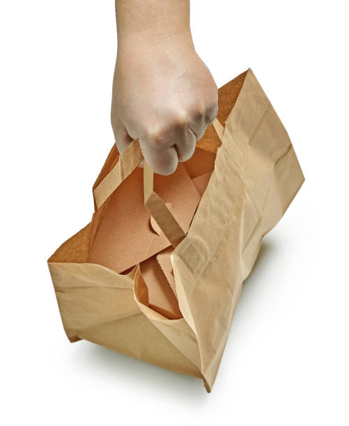 istock paper bag in human hand 1400132782
