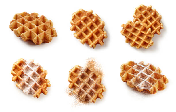 set of freshly baked belgian waffles isolated on white background