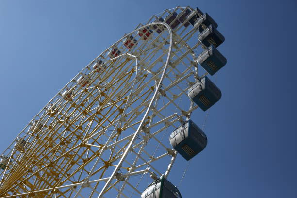 istock Ferris wheel. Amusement park with a big wheel 1400133174
