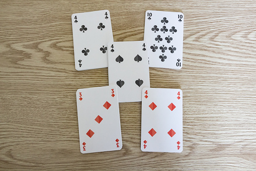 High card, on a dark green poker background. Poker combinations. Poker Hands. Gambling background