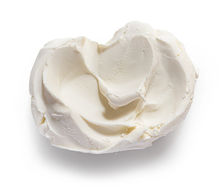 fresh cream cheese isolated on white background, top view