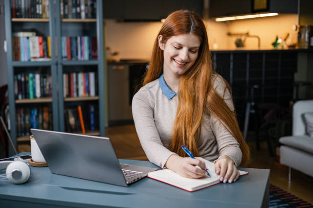 istock Planning and writing with a smile 1400139489