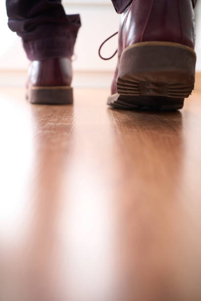 istock View from behind shoes taking a step away and copyspace 1400144254
