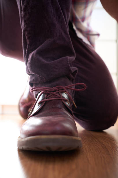 istock Front view of an elegant shoe with the knot made 1400144255