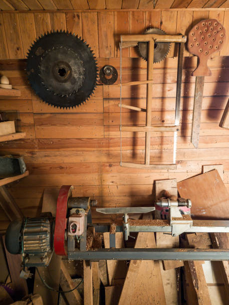 istock Carpenter's workshop with a lathe and various saws. 1400149066