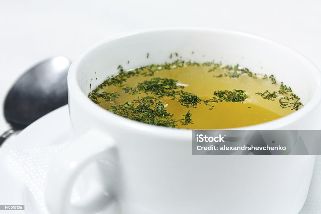 Chicken broth Chicken broth with herbs. Nutrient and tasty first course Fennel Stock Photo