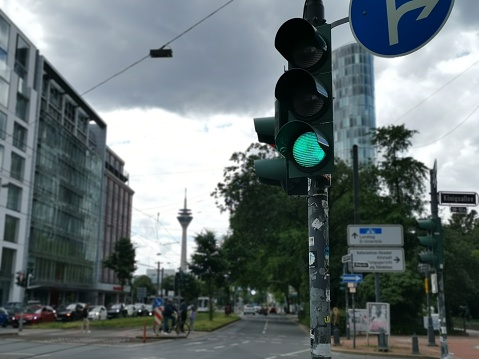 Road sign and traffic lights on the corner of Oxford Street and Syd Einfeld Drive in Bondi Junction, Sydney.  This image was taken on a sunny afternoon on 30 December 2023.