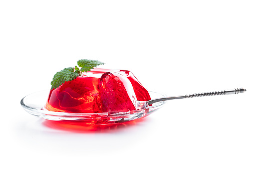 Fruit  jelly with fresh strawberry isolated on white