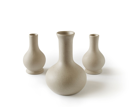 Porcelain vases on white background