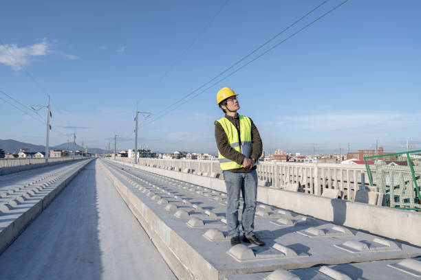 istock An Asian male engineer works on an unfinished railway site 1400158784