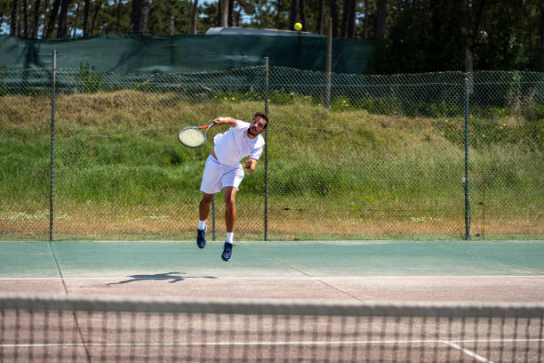 istock Tennis player performing a service 1400163702