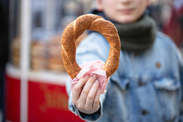 istock Boy holding traditional Turkish Bagel 1400164105