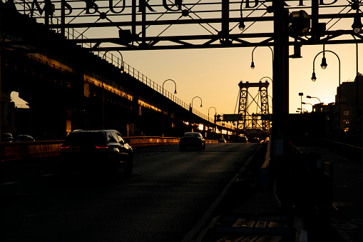 Sunset behind the Williamsburg Bridge in Brooklyn.