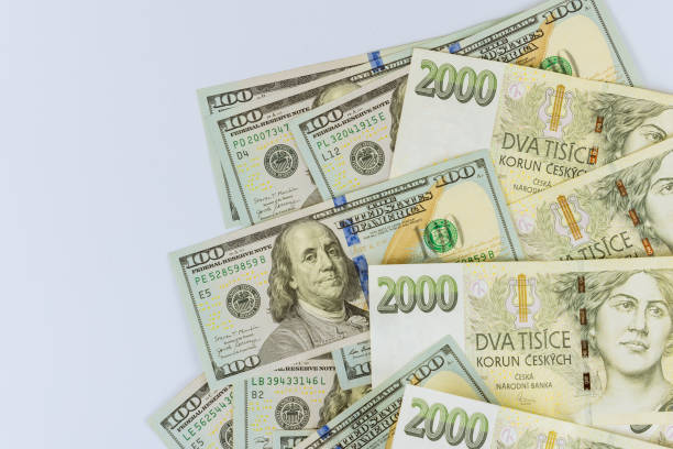 czech korunas czk banknotes money currency and hundred dollar bill - czech culture currency wealth coin imagens e fotografias de stock