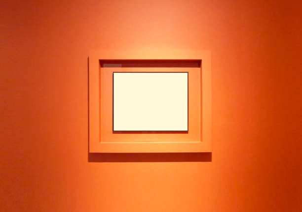 istock Blank picture frame mockup on orange background 1400170778