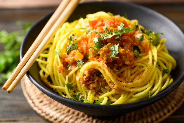 istock Noodle mixed with spicy tomatoes sauce 1400172302