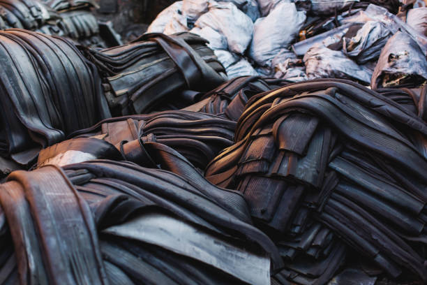 istock Recycling of rubber and plastic. Processing plant. Nature pollution. Environmental disaster 1400175504