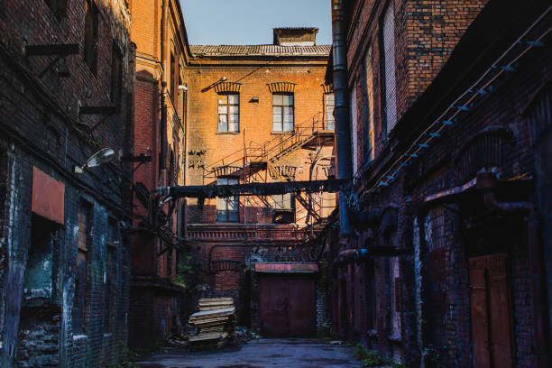 Abandoned building. Old abandoned factory. Gothic background. Scary place. Post apocalyptic landscape. Industrial background. Horror. Destruction