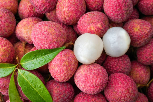 istock Pile Lychee Fruit With Little Leaf For Background. Summer Fruit Background. 1400176400
