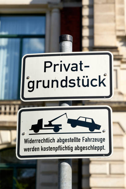 istock private property, parked vehicles will be towed away 1400178120