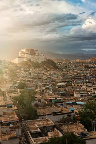 Sunrise over Shigatse with Little Potala on background, residence of Panchen Lama, Tibet - China