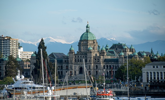 Looking at mountains and Parliament building from Johnson Street bridge, Victoria, British Columbia
