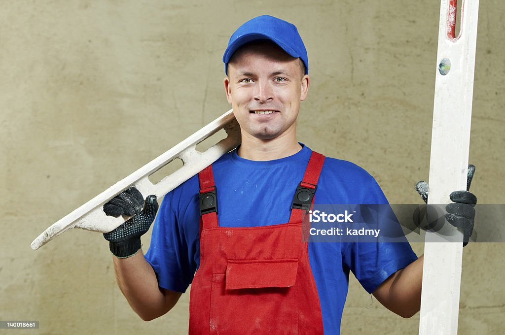 Plasterer en el trabajo - Foto de stock de Enlucidor libre de derechos