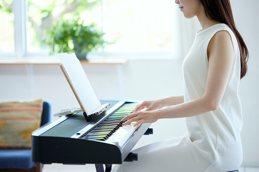 Japanese women play the piano