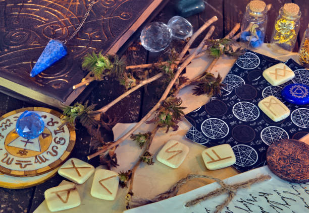 istock Wicca, esoteric and occult still life with vintage magic objects on witch table altar for mystic rituals and fortune telling. Halloween and gothic concept 1400187889
