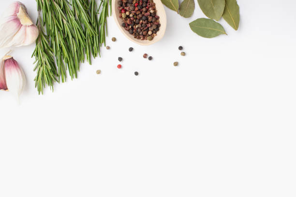 oil with rosemary and spices on a white background