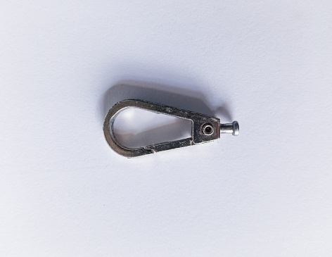 broken accessory hanger on a white background