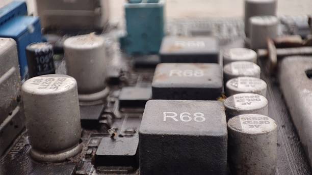 istock old rusty mother board pcb with a small capacitor with some resistor, macro stock image 1400193737