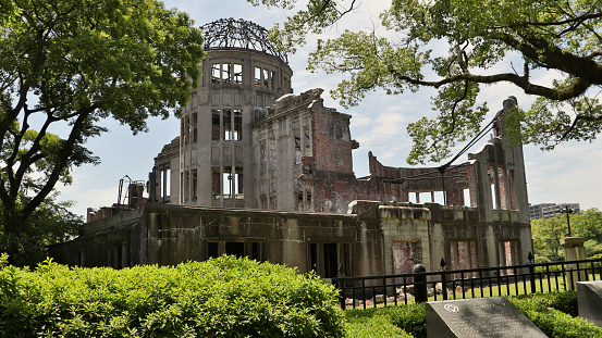 View of the Atomic Bomb Dome, the only structure left standing in the area after the atomic bomb exploded. 2022 May 27 Hiroshima Memorial Park, Hiroshima, Japan