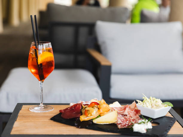 istock Spritz drink aperitif with cutting board of cold cuts and cheeses 1400202756