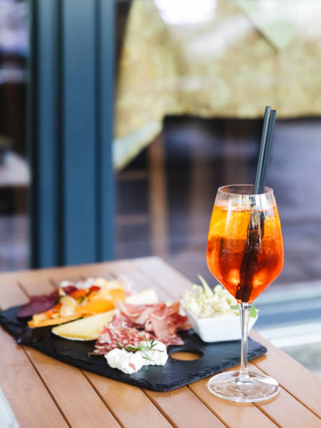 istock Spritz drink aperitif with cutting board of cold cuts and cheeses 1400202772