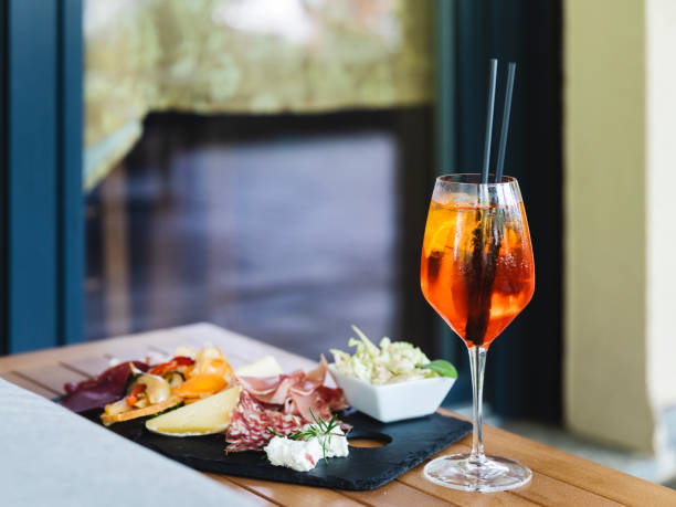 istock Spritz drink aperitif with cutting board of cold cuts and cheeses 1400202773