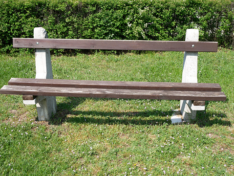 Park bench at the grass area