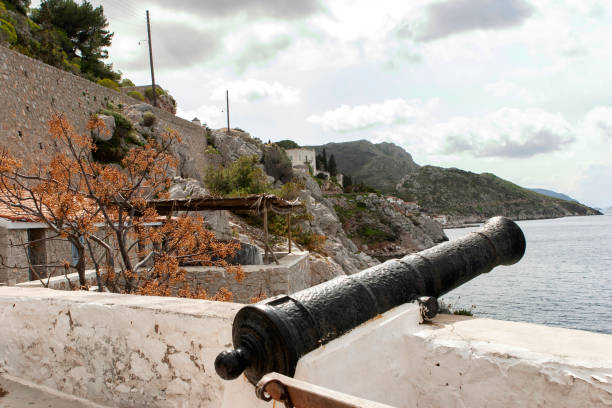 istock Cannon pointing to the sea in Hydra, Greece 1400202986