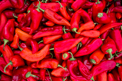 Close up background of hot red chilean pepper. Heap of pepper. Healthy vegetables