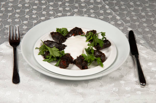 istock Leaf wrap and yoghurt are on a porcelain plate. 1400205976