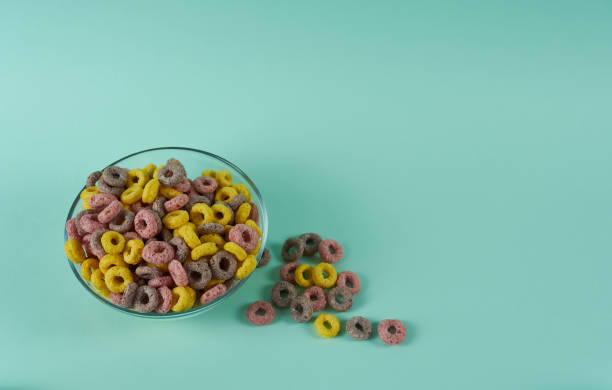 istock Crunchy breakfast cereal rings on a plate in close-up. 1400209518