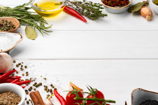 istock Olive oil and spices on kitchen table, close up 1400209873