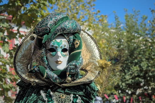 Saint Jean de Luz, France, 09/27/2015 : An elegant woman wearing a Venice Carnival costume